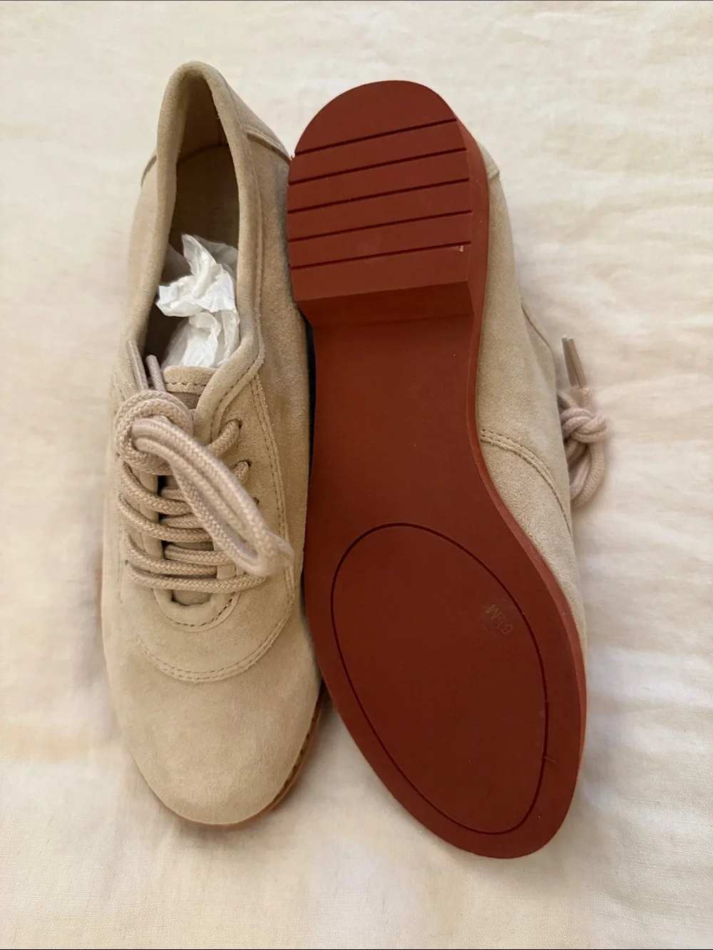Beige Suede Lace-Up loafers.